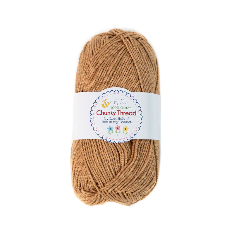 A skein of the Nutmeg Chunky Thread, isolated on a white background.