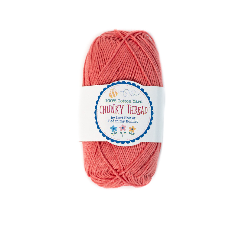 A skein of the Lipstick Chunky Thread, isolated on a white background.