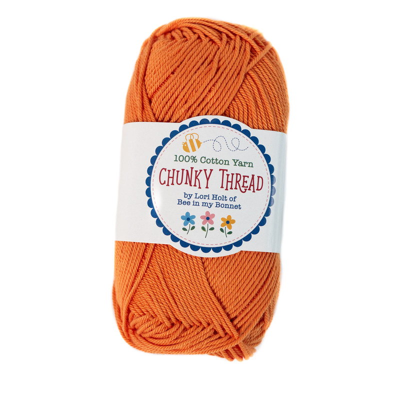 A skein of the Pumpkin Chunky Thread, isolated on a white background.