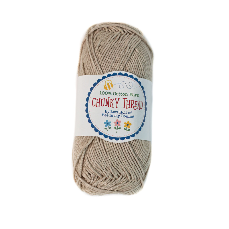 A skein of the Linen Chunky Thread, isolated on a white background.