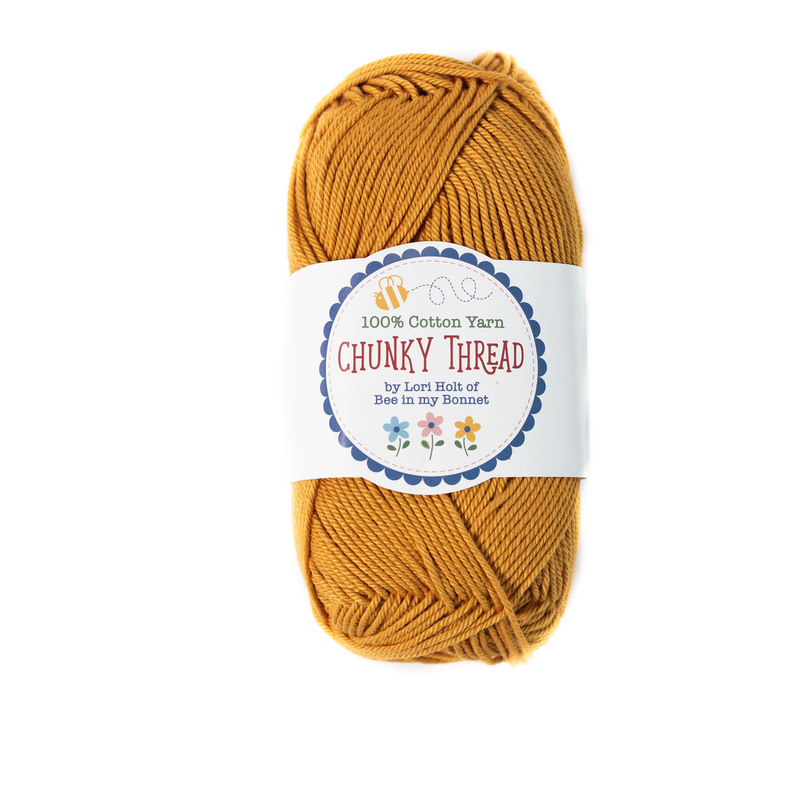 A skein of the Butterscotch Chunky Thread, isolated on a white background.