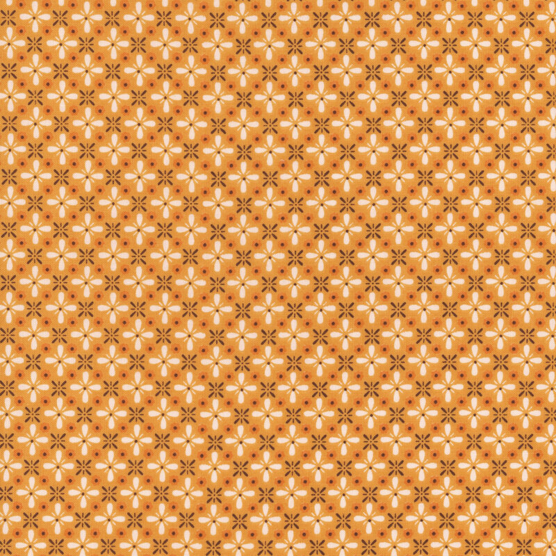 Marigold geometric fabric featuring a lattice design of florals