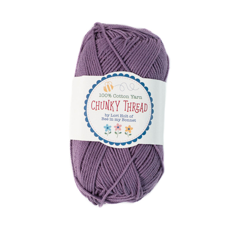 A skein of the Plum Chunky Thread, isolated on a white background.