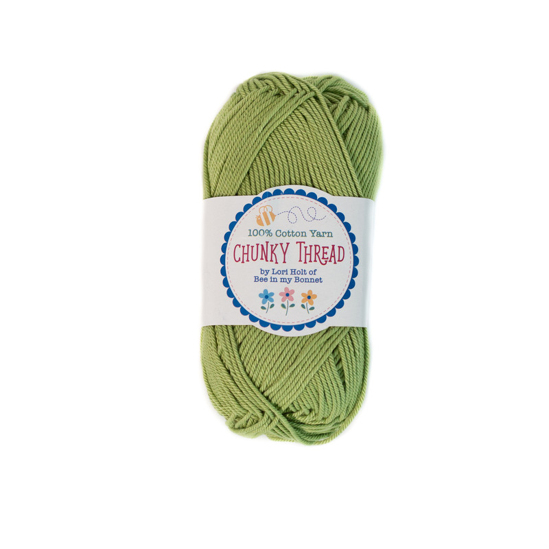 A skein of the Thyme Chunky Thread, isolated on a white background.