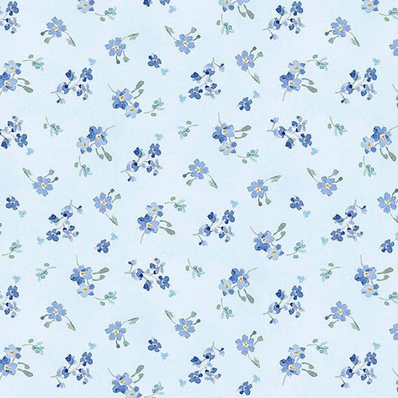 Light blue fabrics with tossed blue floral bouquets in a ditsy pattern