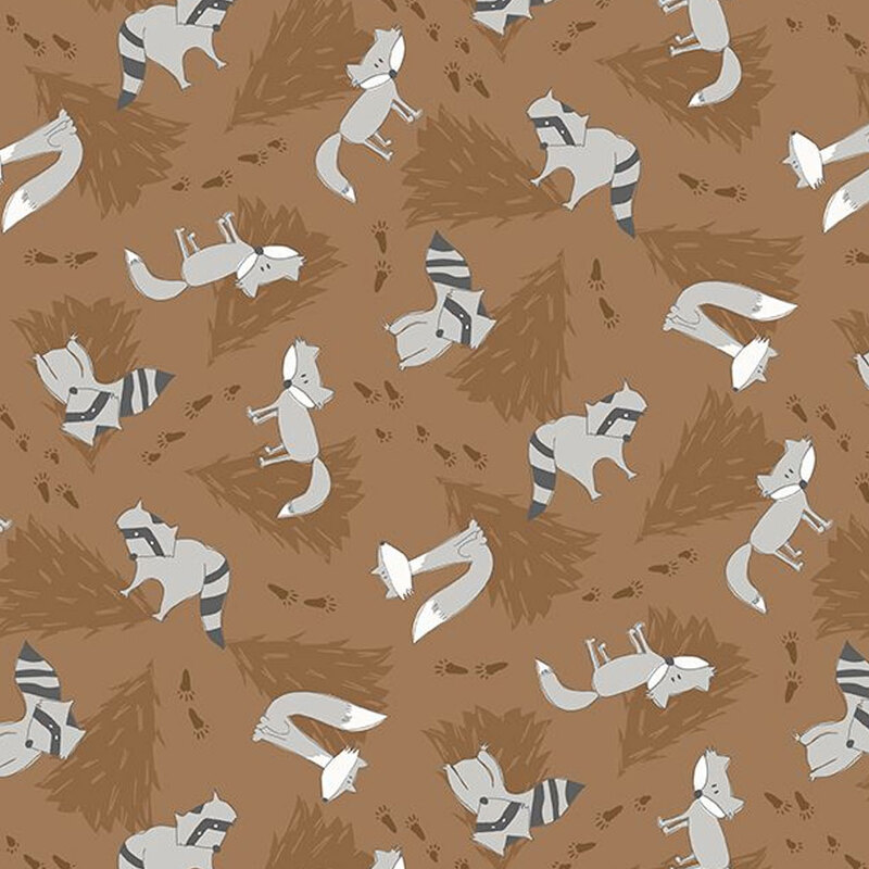 Brown fabric with darker brown pine trees in the background and illustrated racoons and wolves tossed throughout