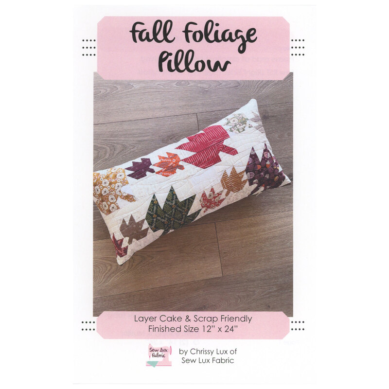 Front cover of the Fall Foliage Pillow pattern showing the finished pillow on a wooden flooring background.