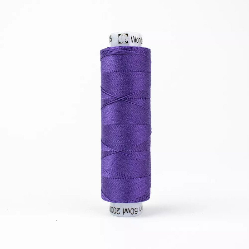 Spool of KT615 Iris thread, isolated on a white background