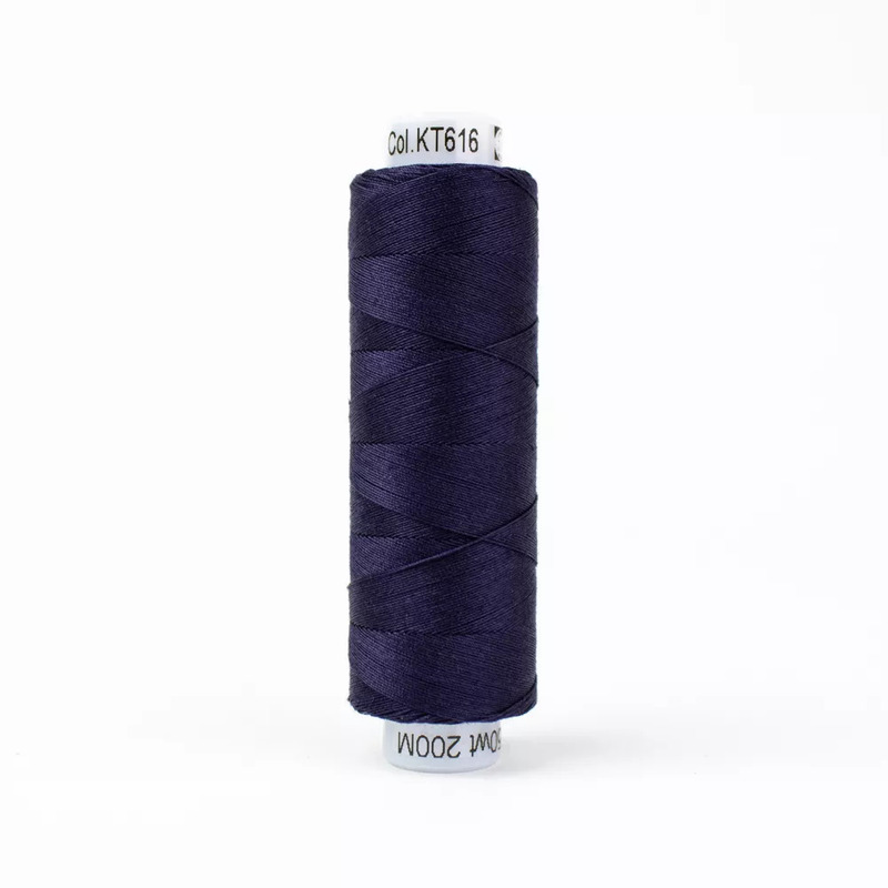 Spool of KT616 Nocturnal thread, isolated on a white background