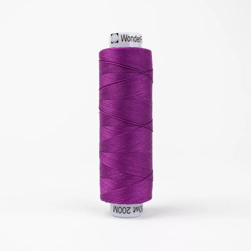 Spool of KT314 Amethyst thread, isolated on a white background