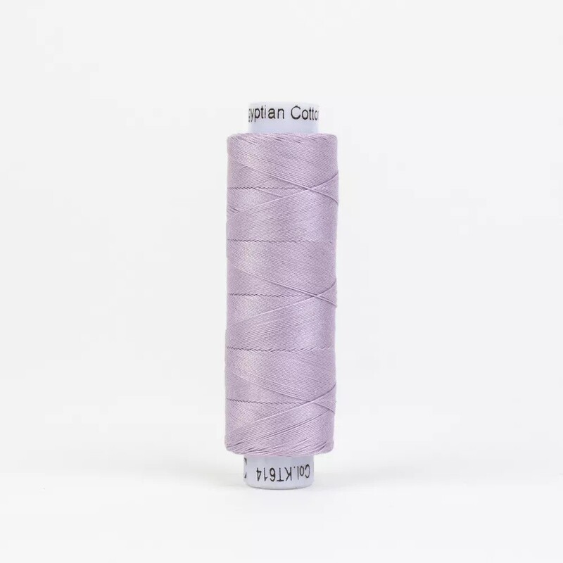 Spool of KT614 Light Mauve thread, isolated on a white background
