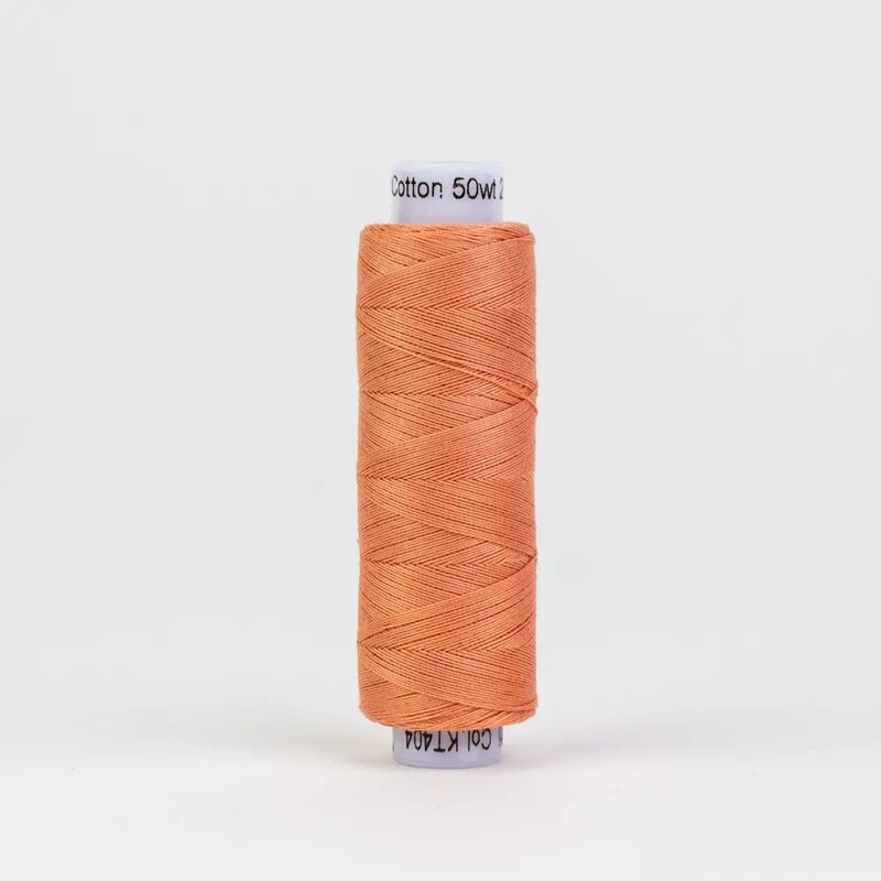 Spool of KT404 Coral, isolated on a white background