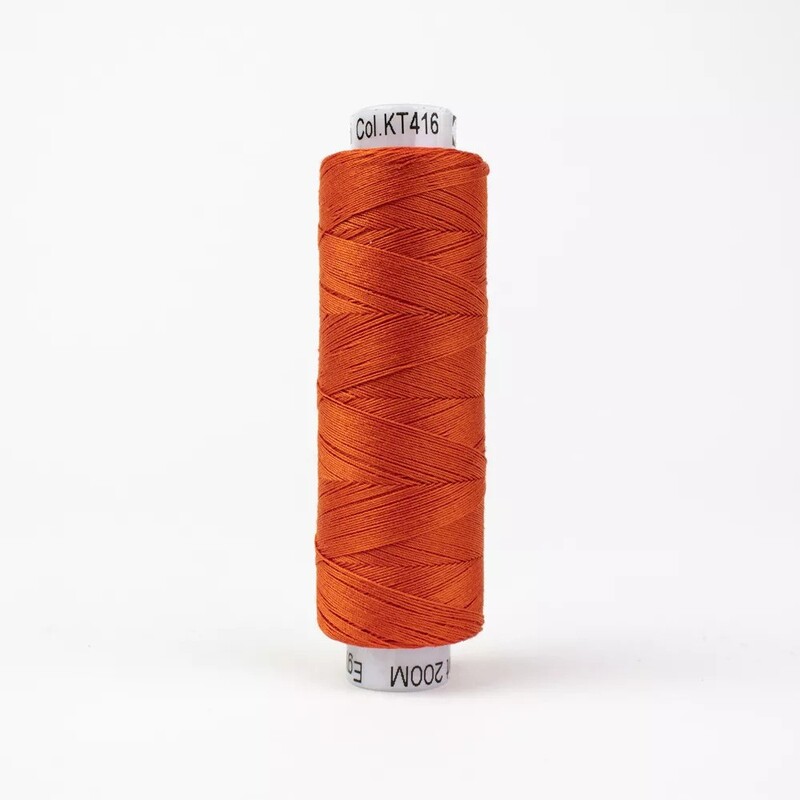 Spool of KT416 Ember, isolated on a white background