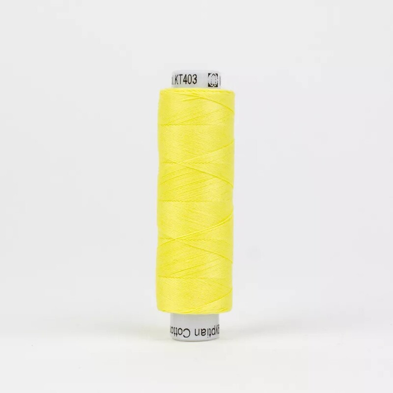 Spool of KT403 Yellow, isolated on a white background