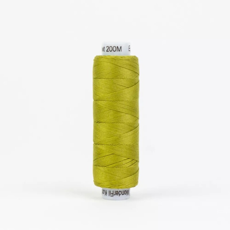 Spool of KT611 Brass Green isolated on a white background