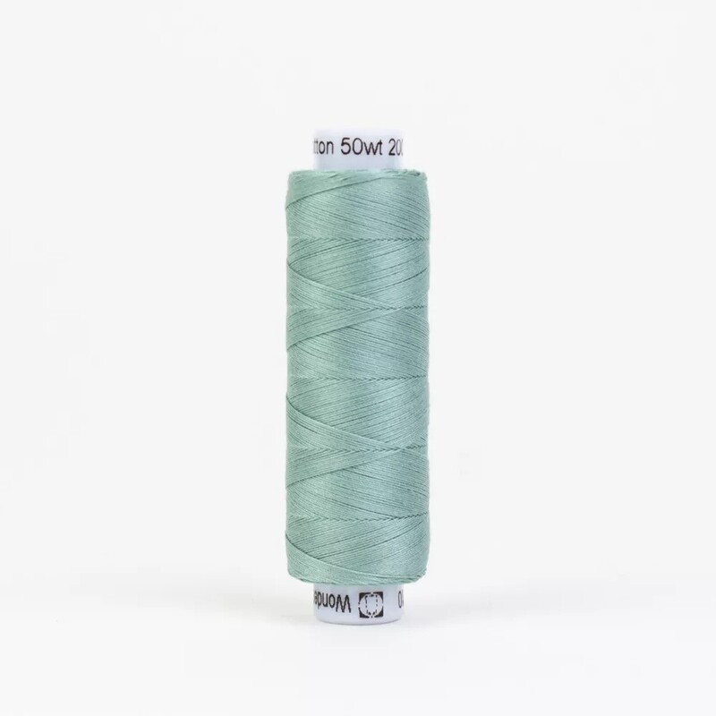 Spool of KT610 Drab Teal isolated on a white background