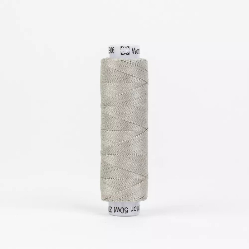 Spool of KT906 Pale Grey isolated on a white background