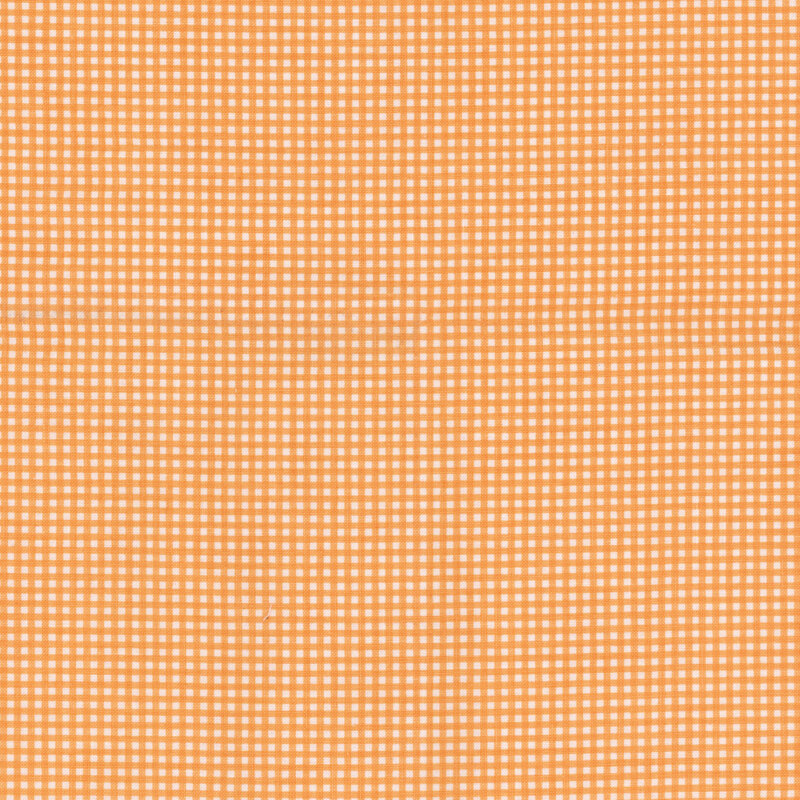 Light orange and white micro gingham fabric.