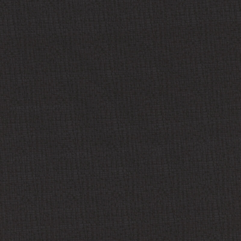 Scan of tonal black fabric featuring a textured crosshatch pattern