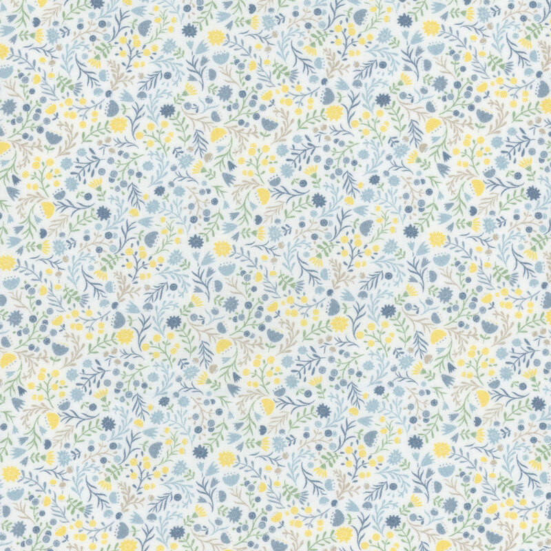 white fabric featuring a packed design of blue and yellow florals