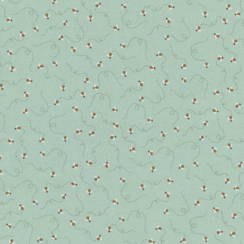 Light mint green fabric with buzzing bees