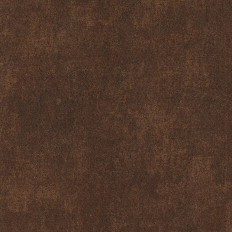 A swatch of brown flannel fabric with a grunge texture.