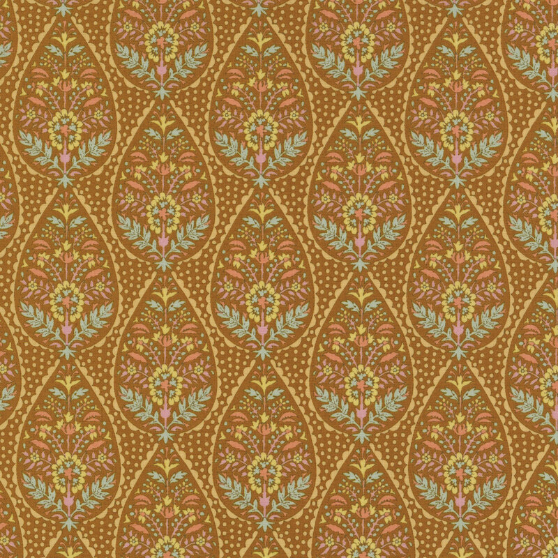 Ochre fabric featuring lines of large raindrop shapes filled with ornate, symmetrical flowers and leaves with a scalloped outline, and scattered dots in between.