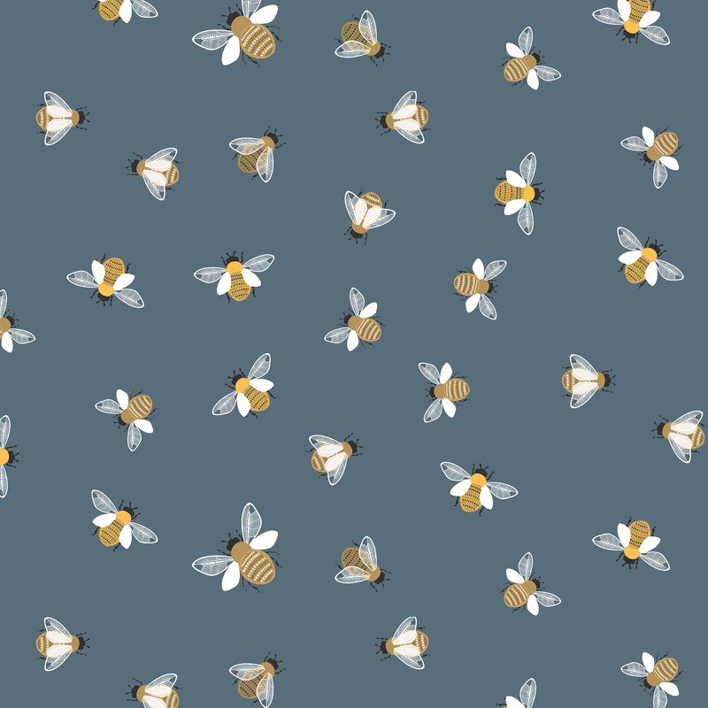 Blue fabric with scattered bees flying and in place from a top-down view.