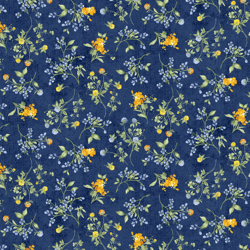Navy blue fabric covered in tossed floral sprigs with yellow, blue, and green flowers