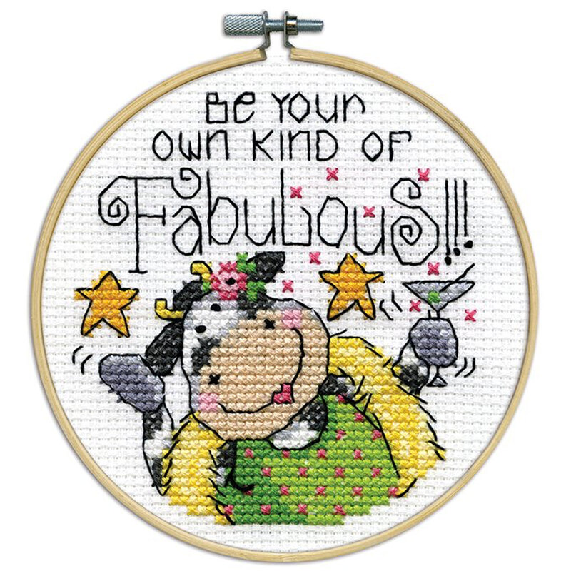 A closeup of the finished Fabulous cross stitch inside a wooden hoop isolated on a white background.
