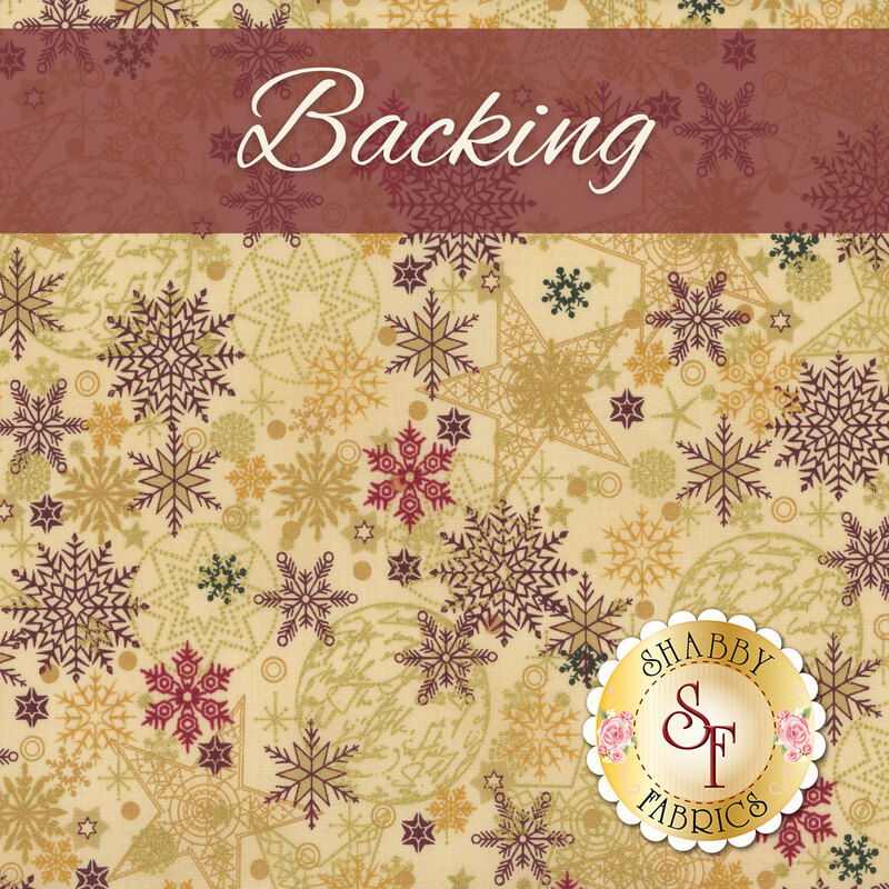 Swatch of cream fabric packed with ornate snowflake designs in tonal colors, burgundy, red, gold, and green. A brick red banner at the top reads 