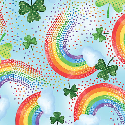 Blue fabric featuring rainbows, shamrocks, and colorful dots