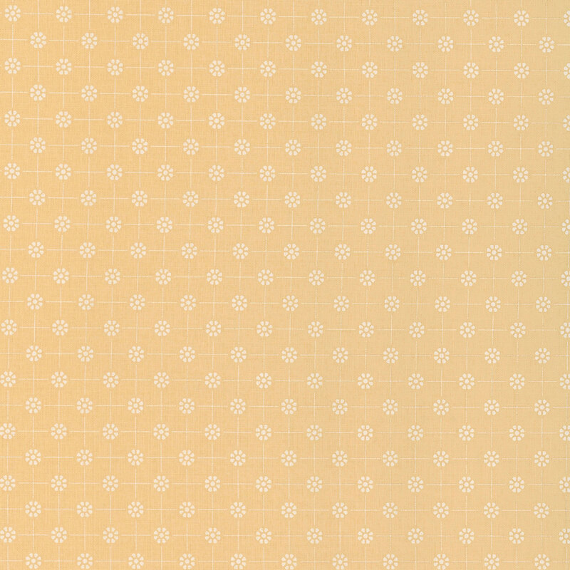 Pale yellow fabric with white dotted florals arranged in a polka dot pattern connected by thin lines
