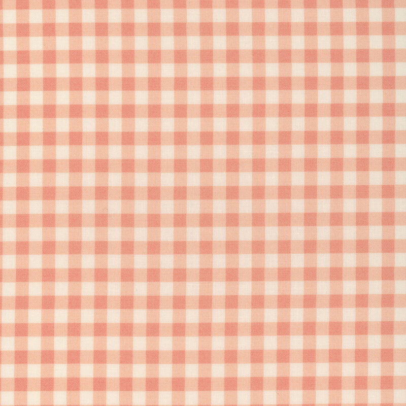 White fabric with a tangerine gingham pattern