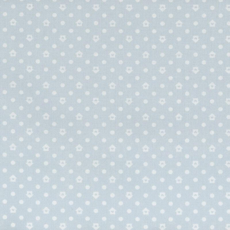 Light blue fabric with a white house and dot pattern