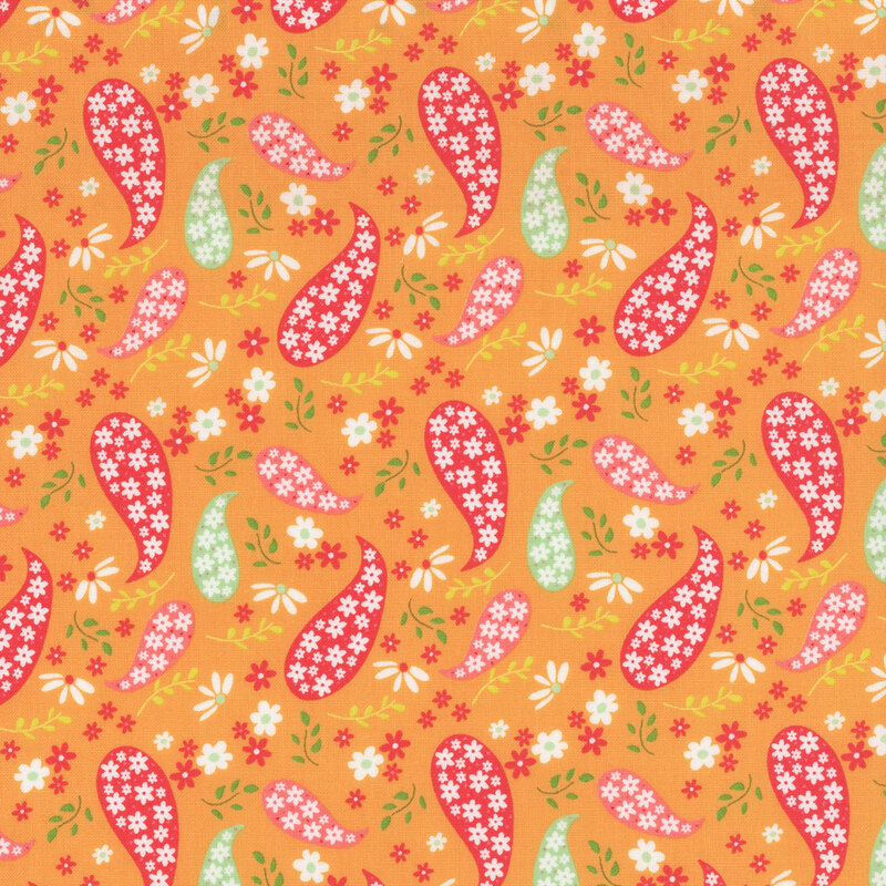 Orange fabric with tossed multicolor paisley designs with small flowers scattered between.