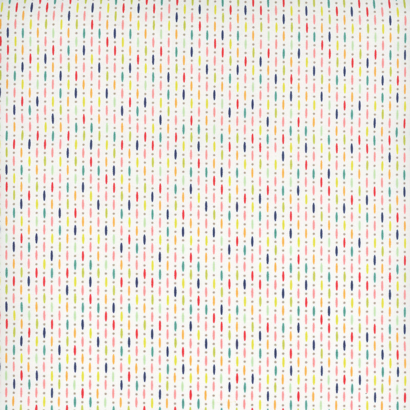 White fabric with multicolored stripes interspersed with small polka dots, visually similar to a bead curtain..