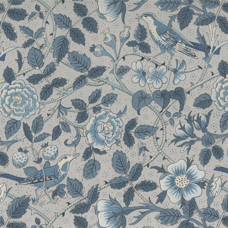 Light blue fabric featuring birds amidst the sprawling vines and blooming flowers 
