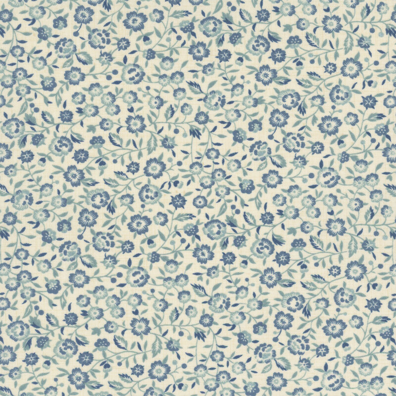 Cream fabric featuring a packed design of blue vines and small florals