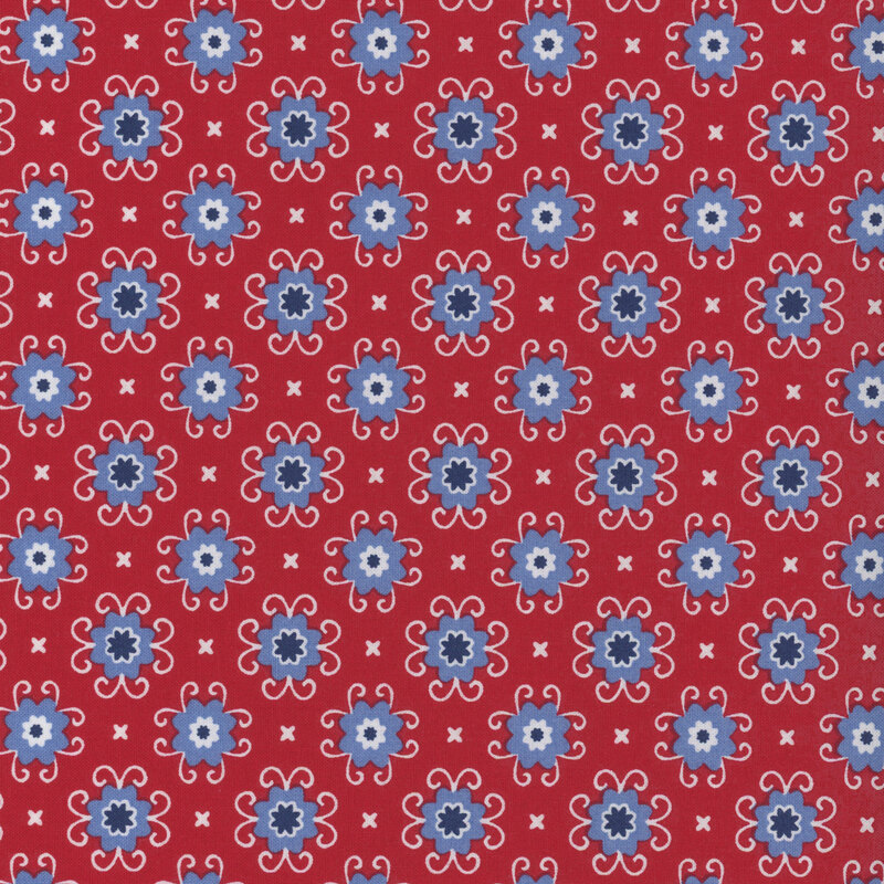 Red fabric with a patriotic colored floral pattern.