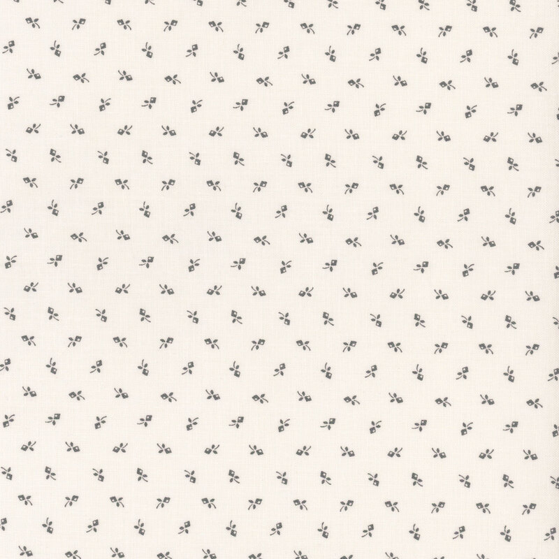 White fabric with a grey floral ditzy pattern