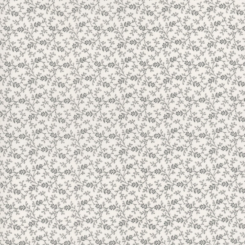 Cream fabric with a grey floral pattern