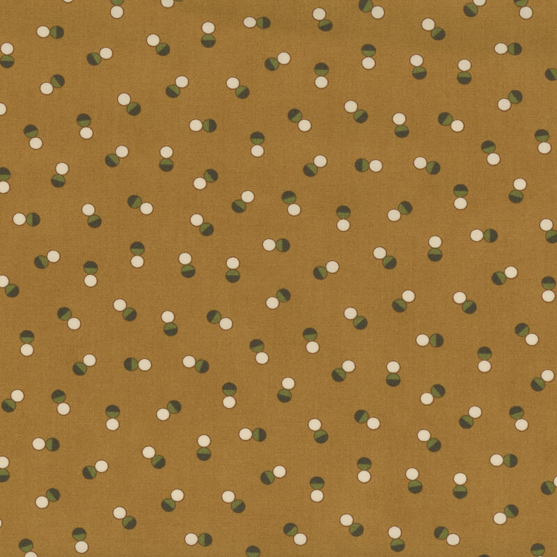 Brown fabric with tossed pairs of black and white dots in random orientations