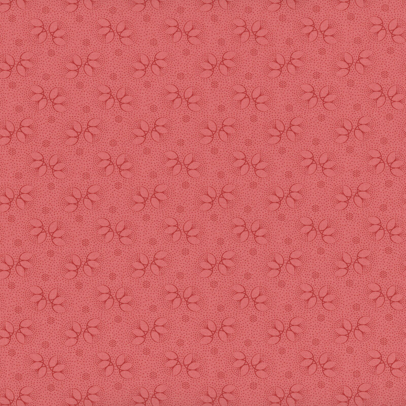 Pink tonal fabric with dark pink floral accents and dots throughout