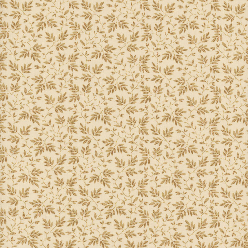 Cream fabric covered in tan leaves and vines