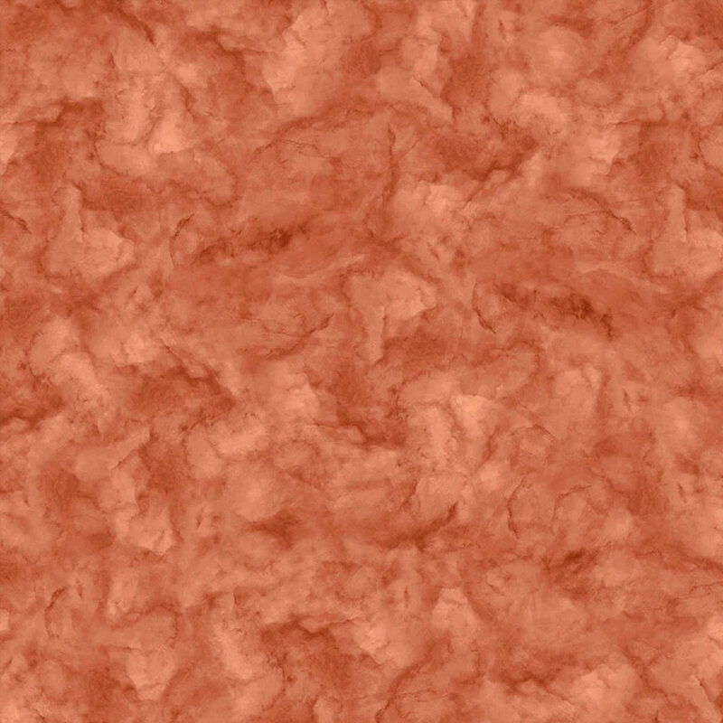 Sienna orange fabric with a mottled design