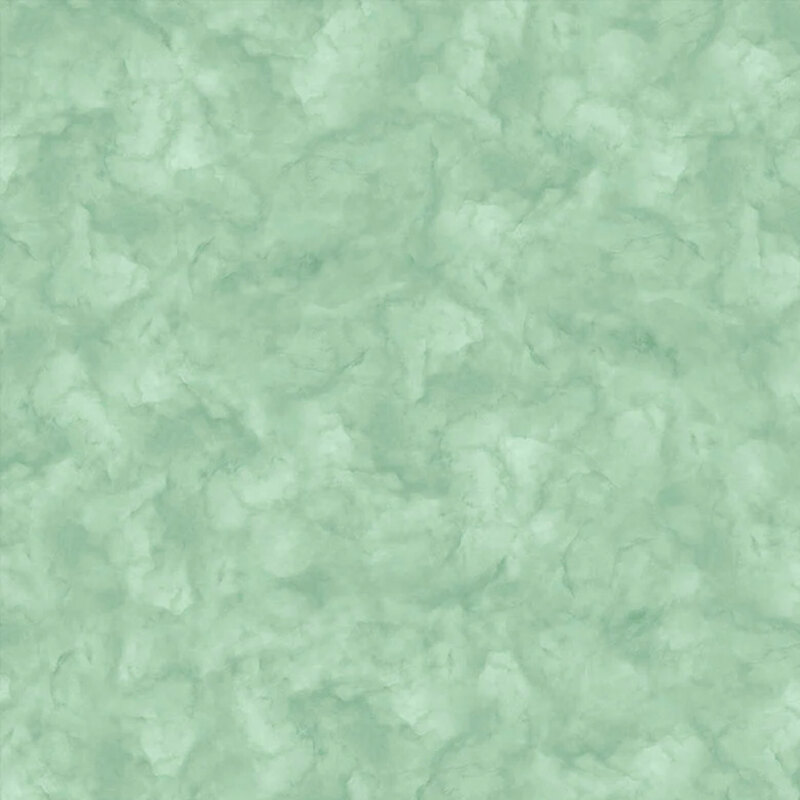 Mint green fabric with a mottled design