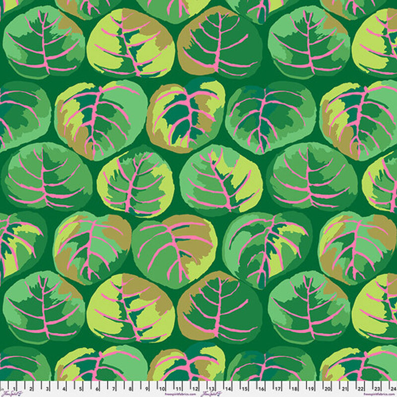 Dark green fabric with large, vibrant green leaves with pink accents