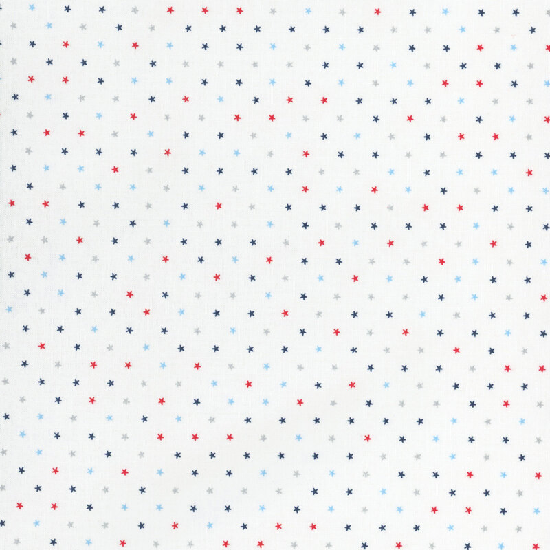 White fabric with a multicolored patriotic star pattern