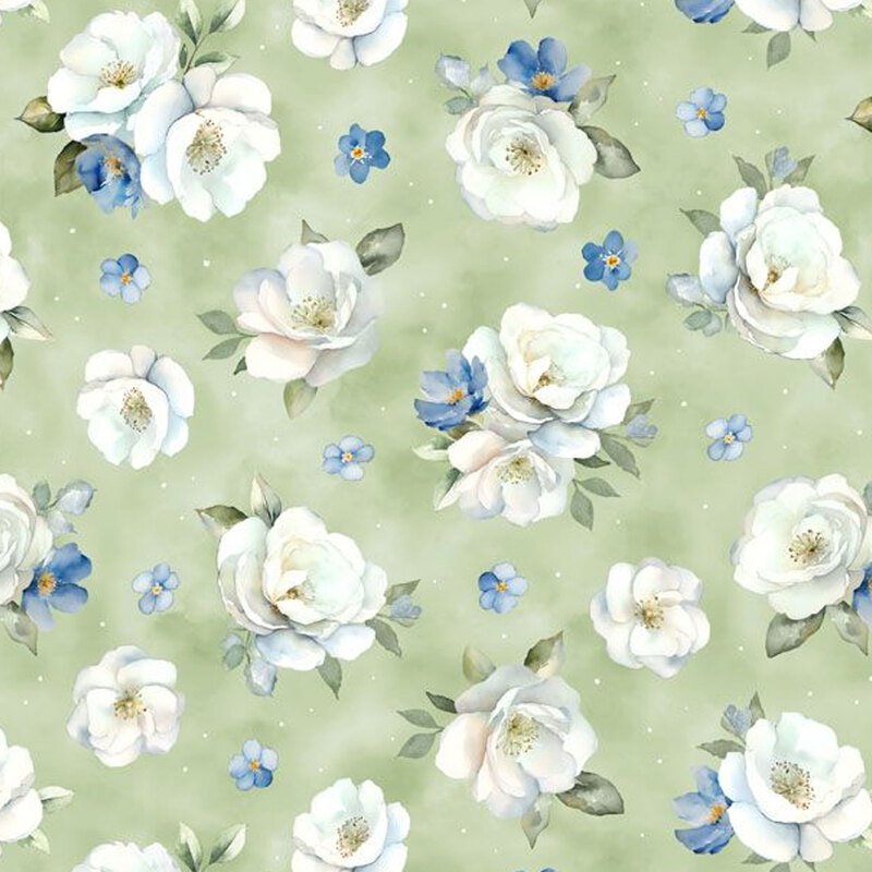 Sage green mottled fabric tossed with large white florals and small blue ones